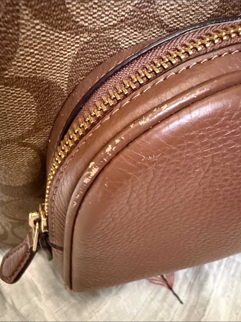 Coach Brown Signature Leather Backpack with gold hardware